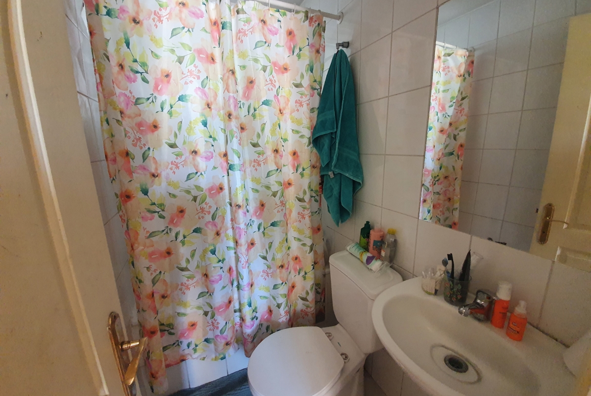 Baño de servicio